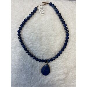 lazuli beaded necklace with a teardrop-shaped lapis lazuli pendant